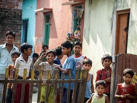 Amroha, Utter Pradesh, INDIA - 2011: Unidentified poor people living in slum - smiling children