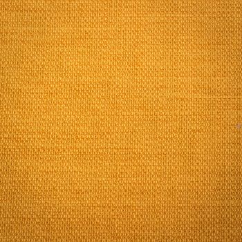 Rustic canvas fabric texture in yellow color.