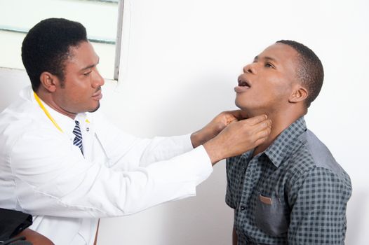 The  doctor touches the troat of his patient  whether  he feels pain.