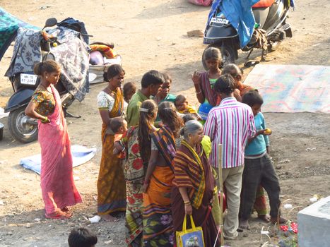 A family of poor people in India discussing their problems                               