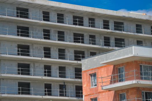 Building, House under construction and crane, France
