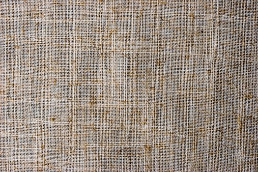 Natural flax napkin background close-up