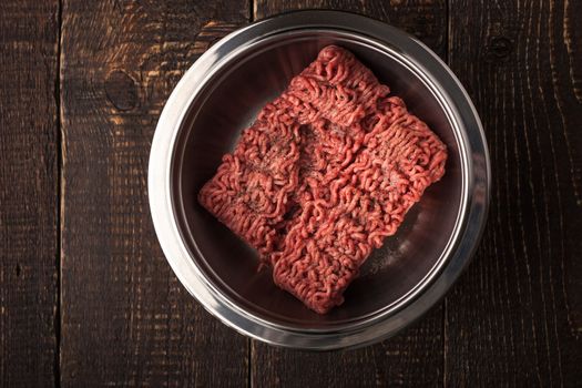 Ground beef with pepper in the metal pan  horizontal