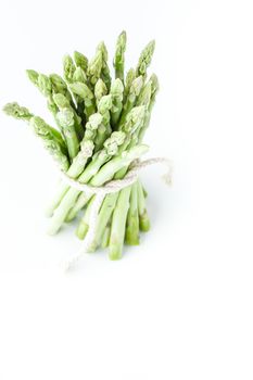 Bundle of asparagus on the white background