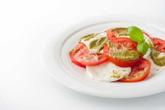 Caprese salad on the white background horizontal