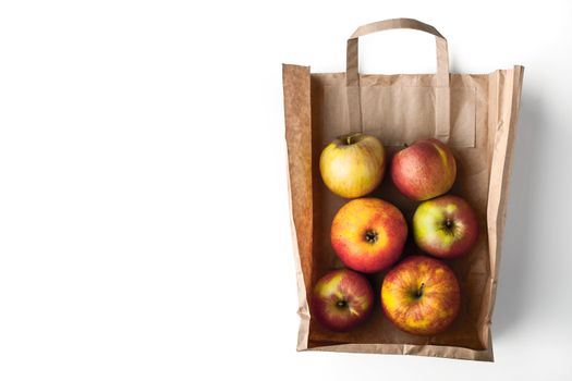 Apples inside a paper bag