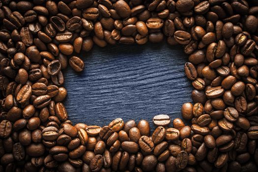 Coffee bean frame on the dark background horizontal