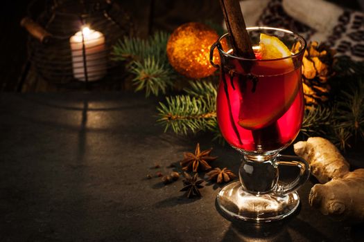 Mulled wine with spices and Christmas decorations horizontal