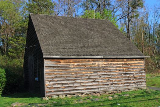 Side of a Barn - Farm building, with old weathered wooden planks.