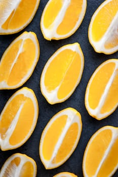 Yellow lemons on a blue stone table horizontal