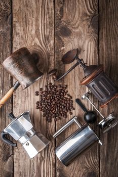 Accessories for coffee on the wooden table vertical