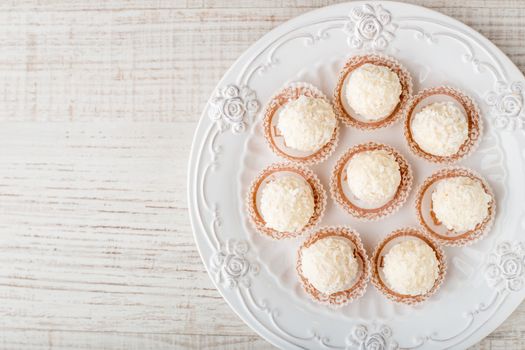 Candy coconut flakes on a plate horizontal