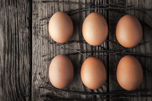 Chicken eggs on a wooden table horizontal