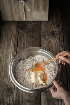 Shelf and ingredients for cookies on gray disks vertical