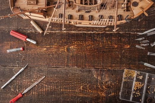 Model ships from the tree on a brown table horizontal