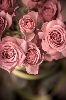 Bouquet of roses with green tape vertical