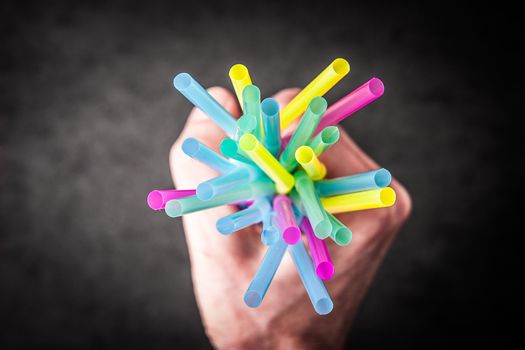 Cocktail Sticks in a female hand horizontal