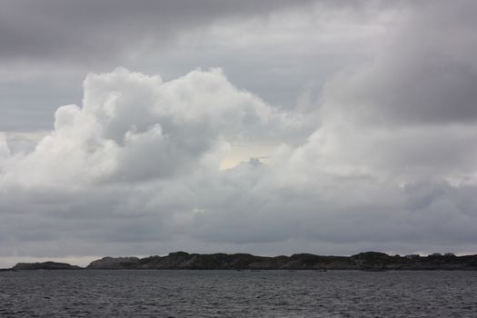 Viwe from Hjelme i Øygarden. Can it be a tower hidden in the cloud?