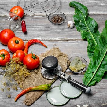 Tomato,spices and cooking utensils for pickling vegetables