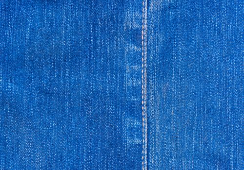 Beautiful Vintage Blue denim jeans for back ground , textile and etc.