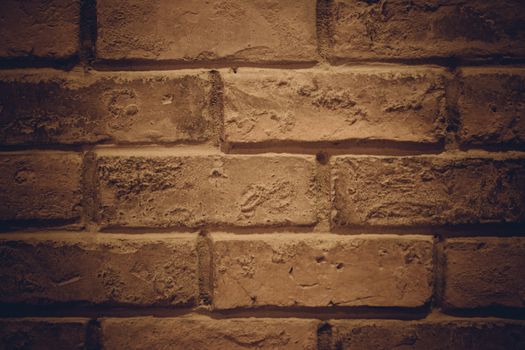 Weathered texture of stained old dark brown and red brick wall background