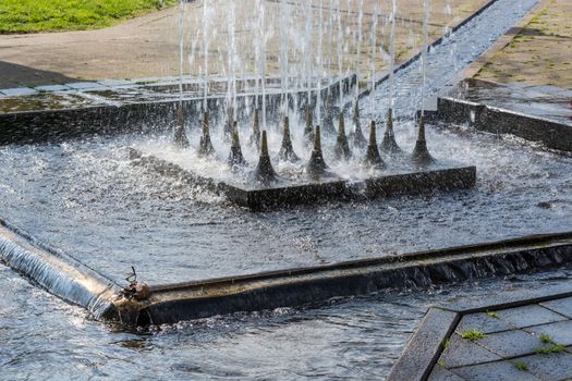 Artificially designed waterfall, fountain - Fountain in a park.