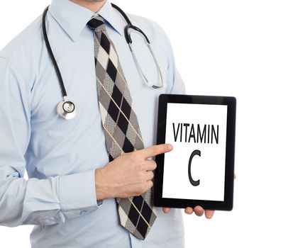 Doctor, isolated on white backgroun,  holding digital tablet - Vitamin C