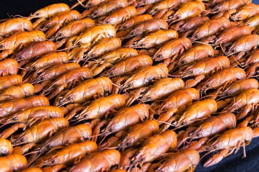 Photo of background with red boiled crawfishes