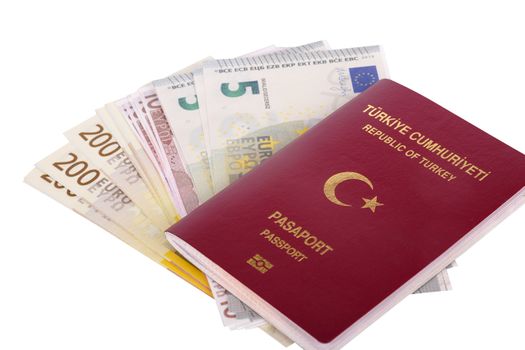 Finance concept, euro money banknotes in passport with the text Republic of Turkey in Turkish, isolated on white background.