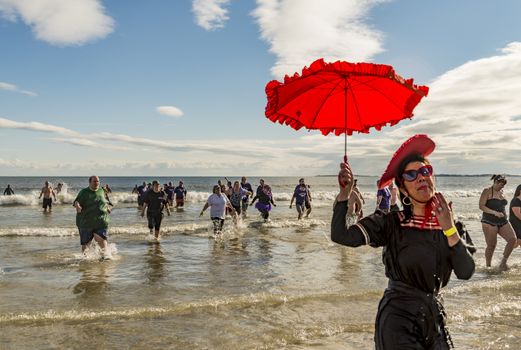 OLD ORCHARD BEACH - JANUARY 1 2016: several hundred people took part in the annual Lobster Dip Plunging on January 1, 2016 in Old Orchard Beach, Maine USA