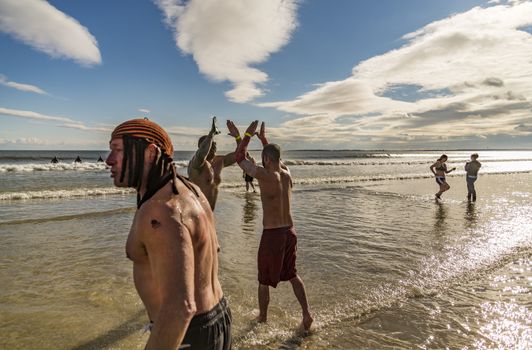 OLD ORCHARD BEACH - JANUARY 1 2016: several hundred people took part in the annual Lobster Dip Plunging on January 1, 2016 in Old Orchard Beach, Maine USA