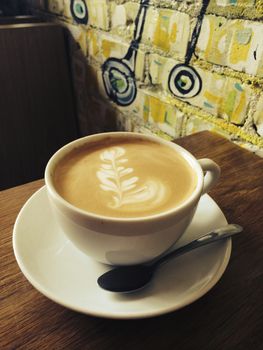 Large coffee mug in cafe,