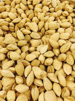 Almond nuts in shells, healthy snack.