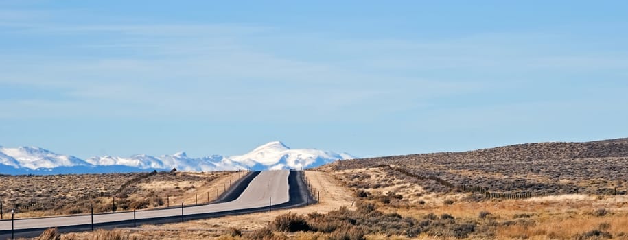 Looking at the Wind River Mountains in Wyoming from the sagebrush covered high plains.