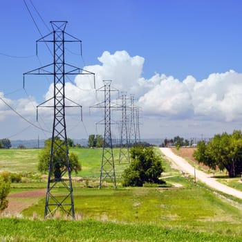 Power lines going into the distance across rural eastern Colorado, USA