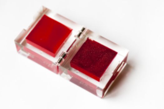 photographed close-up cosmetics female red lip, defocused, defocus