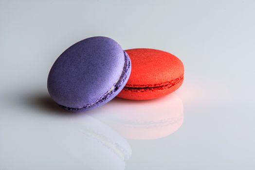 Colorful macaroons on a neutral background