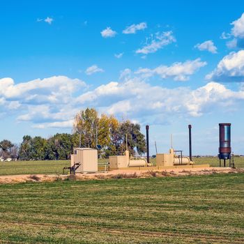 Treater system to separate water from the pumped product, locate on farmland in central Colorado, USA