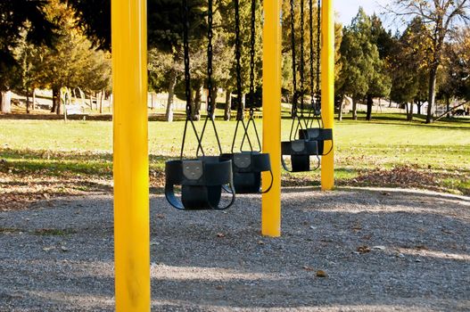 Wheatland, Wyoming USA city park, toddler swings