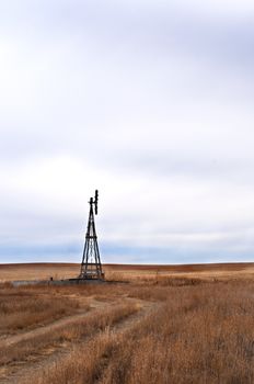 Windmill to pump livestock water on the eastern Colorado plains in the USA.