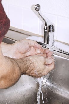 Staying germ free by doing frequent hand washings.