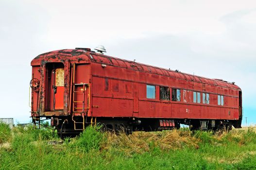 Antique passenger railcar abandoned and forgotten 