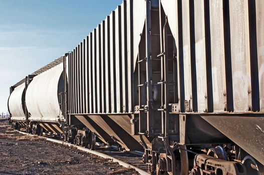 Empty railcars waiting on a siding to be loaded with grain from the local silo.