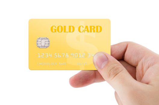 Hand holding plastic gold credit card