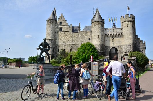 Antwerp, Belgium - May 11, 2015: People visit Steen Castle (Het steen) on May 11, 2015. Het Steen is a medieval fortress in the old city center of Antwerp, Belgium.