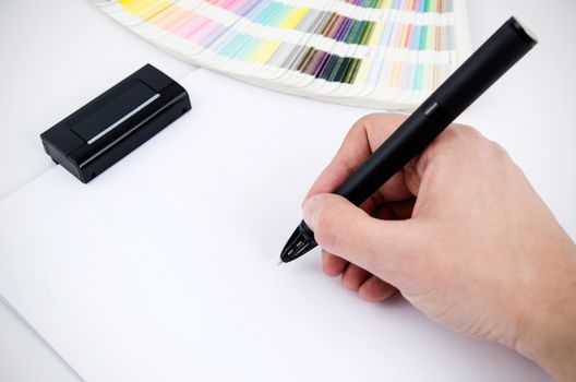 Graphic designer working with modern digitized pen