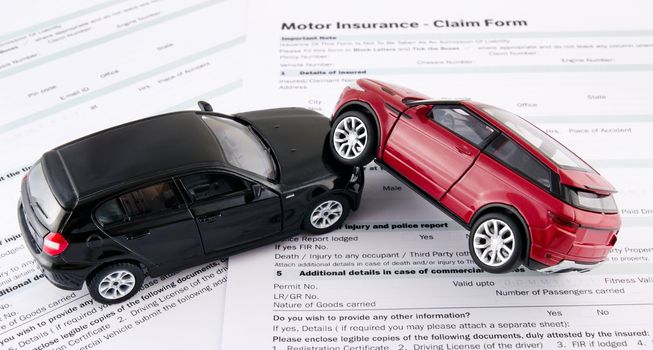 Motor insurance claim form. Car crash and protection concept