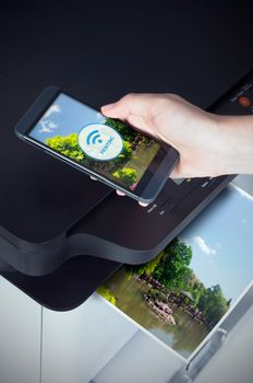 Wireless easy printing with Near Field Communication technology. NFC devices in office