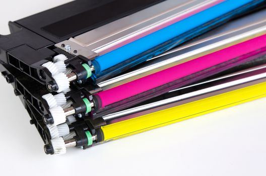 Toner cartridge set for laser printer. Computer supplies on white background.