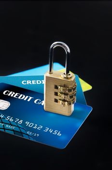 Security lock on multiple blank credit cards close up